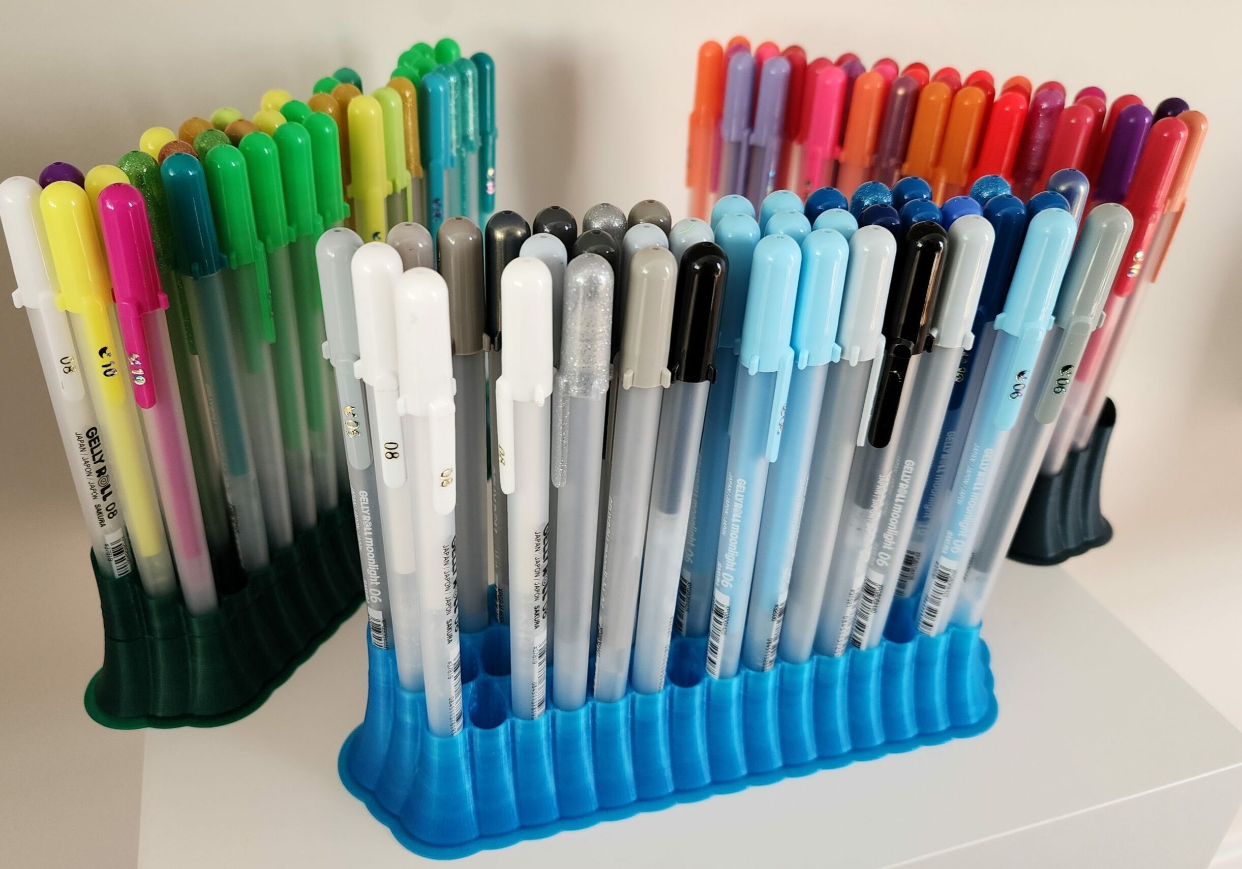Gelly Roll Pens in 3D printed pen holders that allow you to see many colors at once.